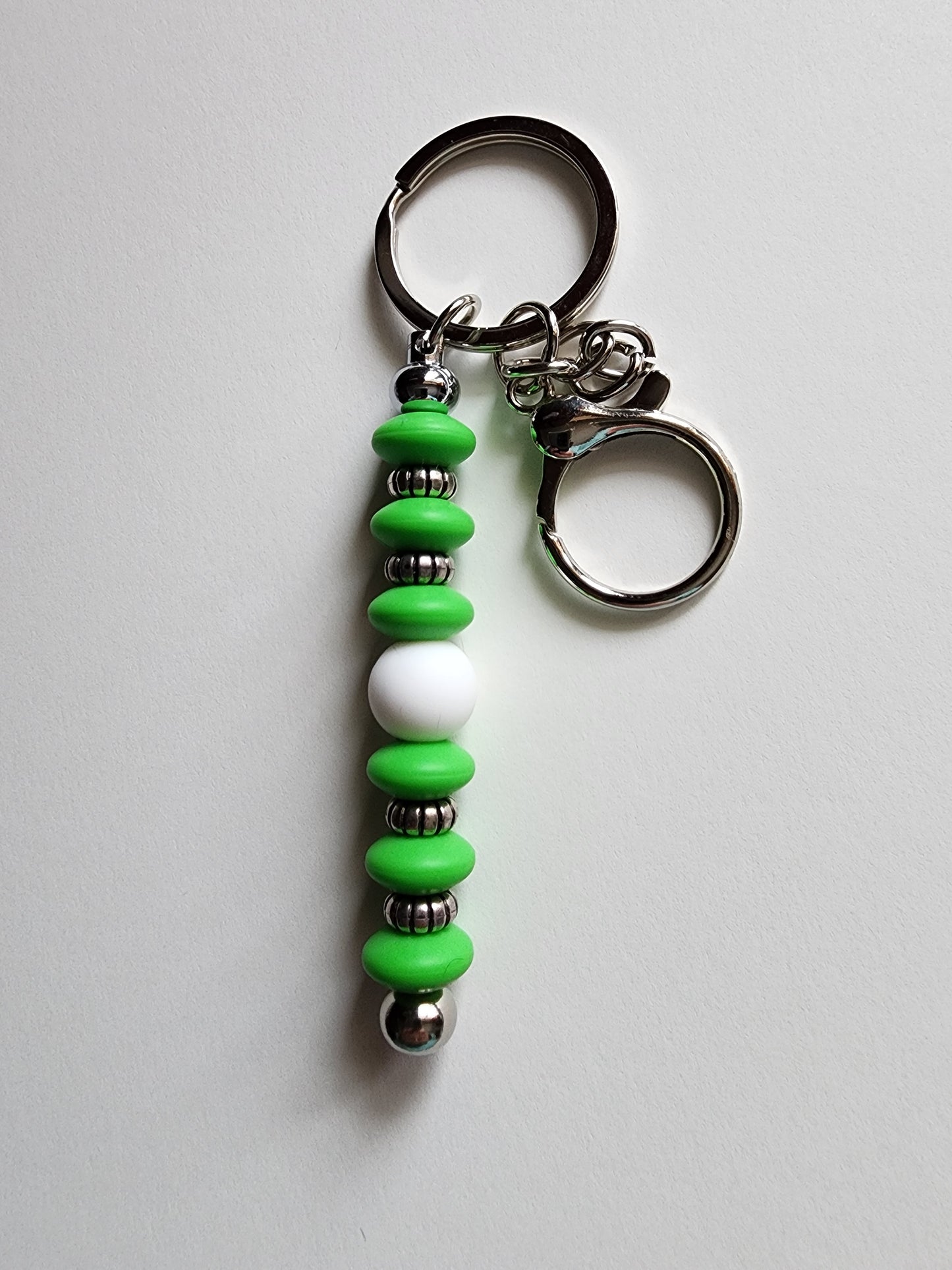 White with Green Lentils and Spacers Bar Keychain