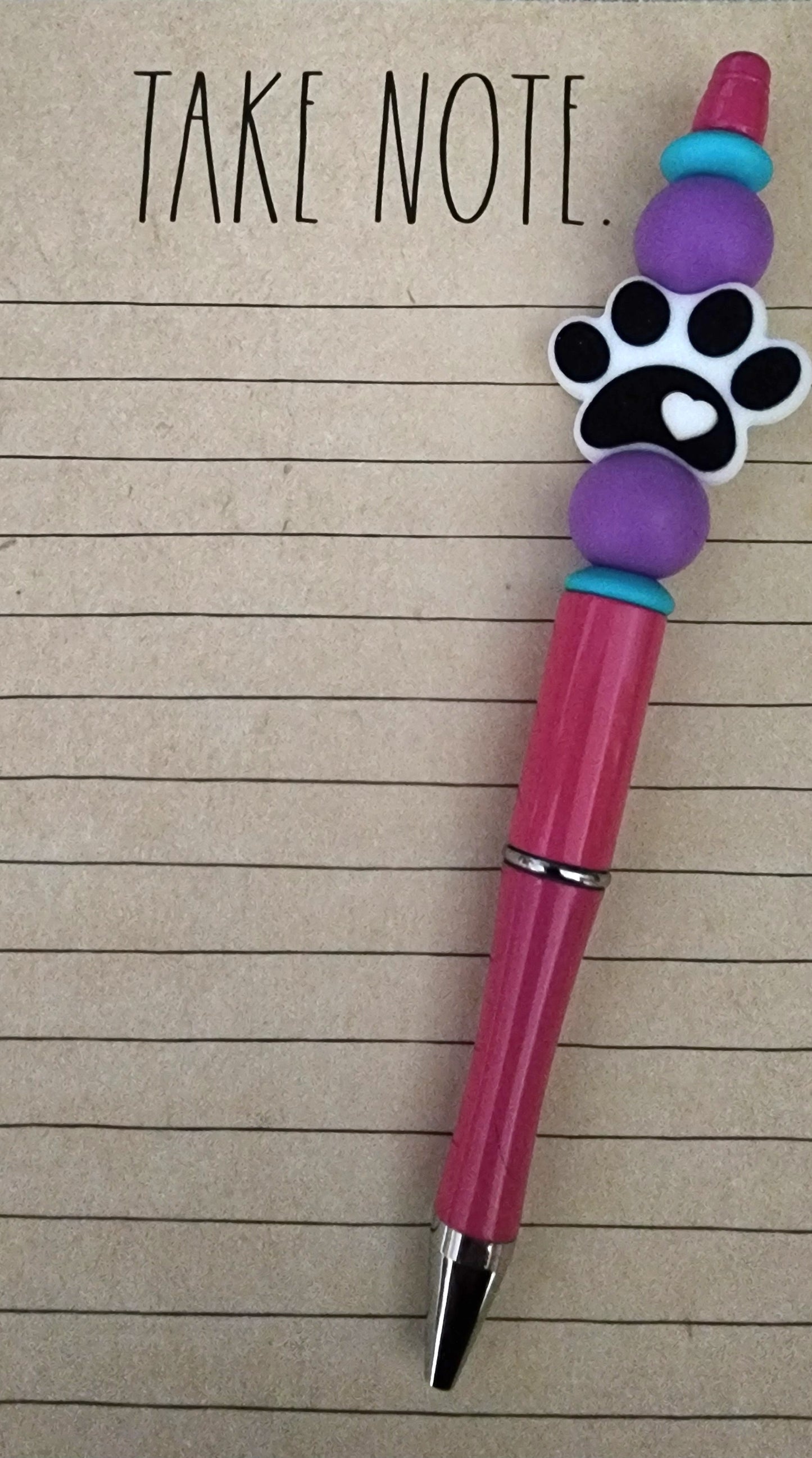 Pawprint with Purple and Teal on Pink Pen