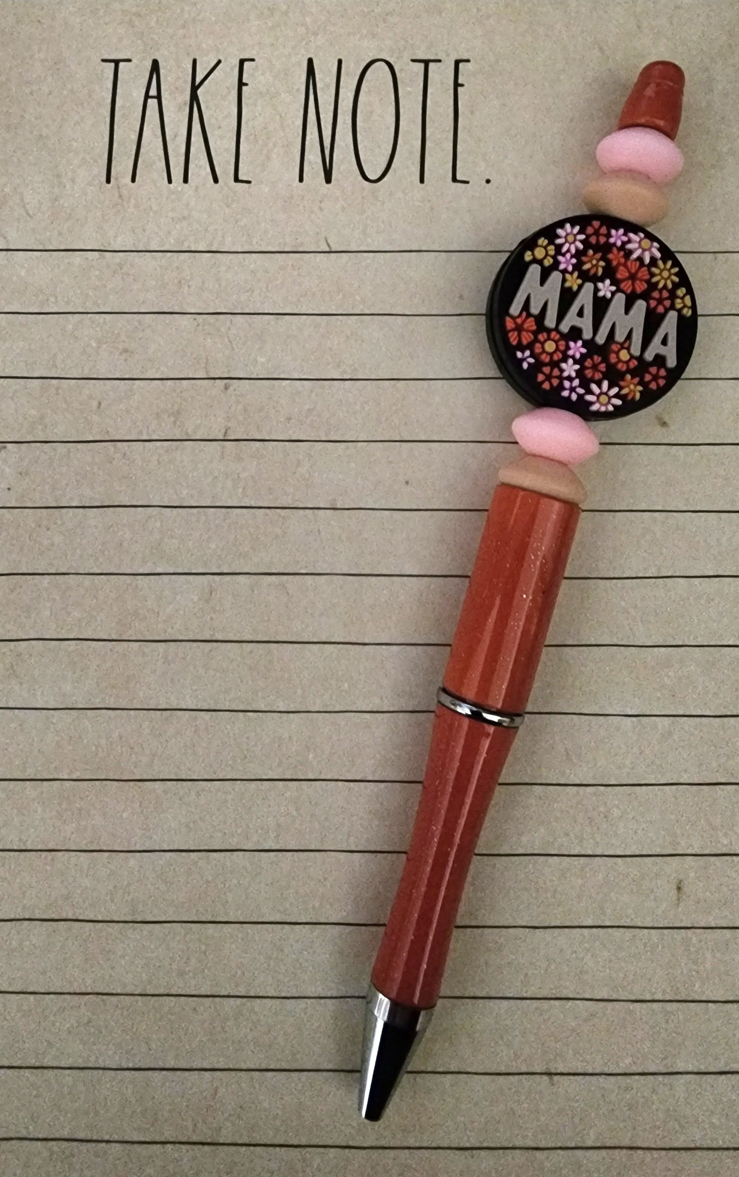 Mama with Tan and Pink Lentils on Burnt Orange Pen