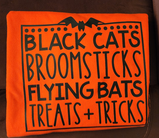 Black Cats Broomsticks Flying Bats Treats + Tricks | Orange Crewneck